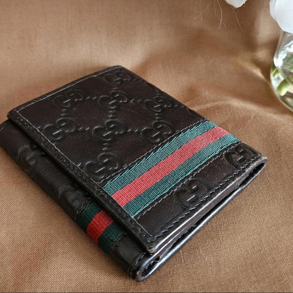 Men's Gucci GG Brown Leather Bifold Card Wallet.